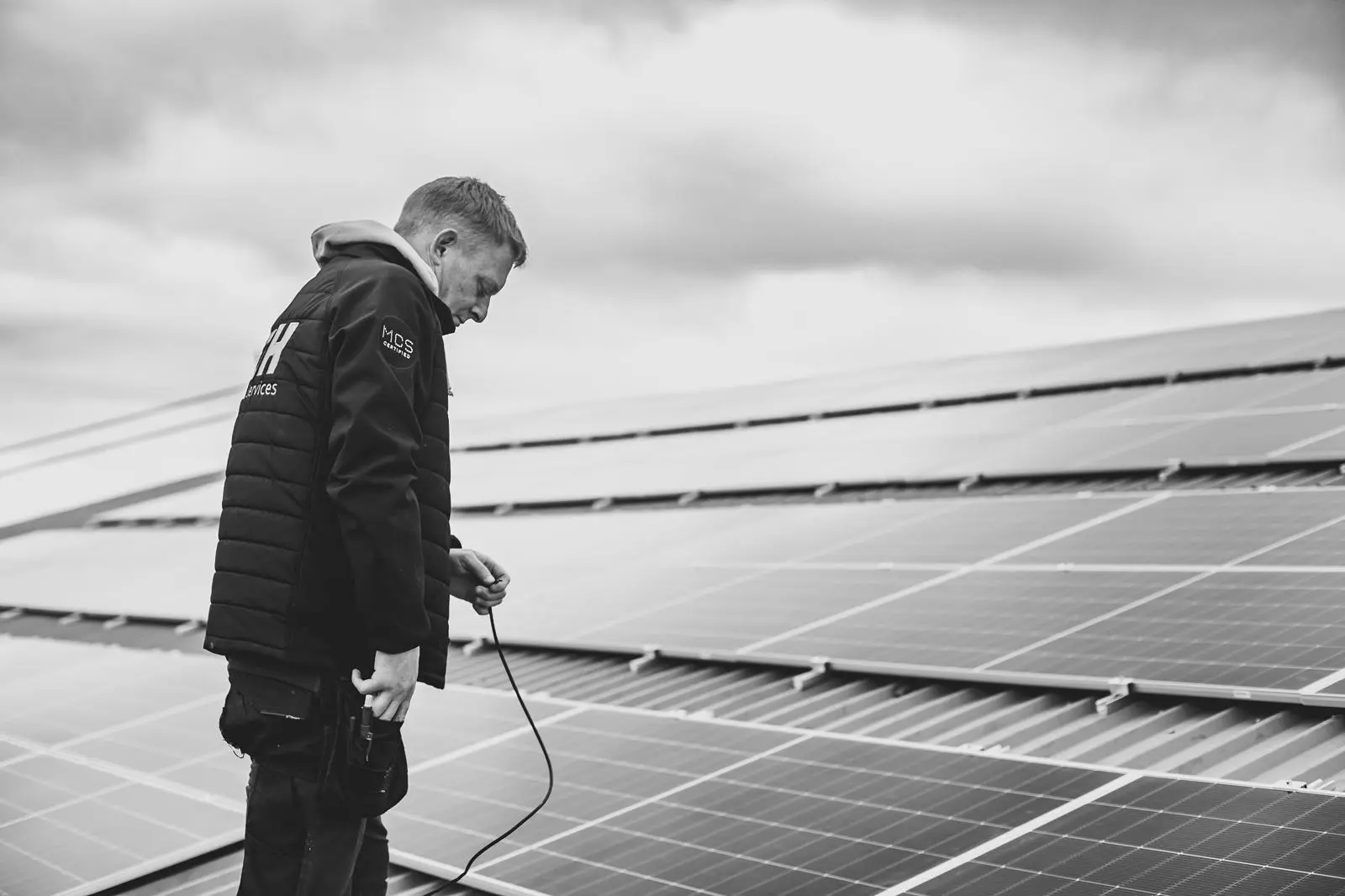JDH team member working on a commercial solar installation