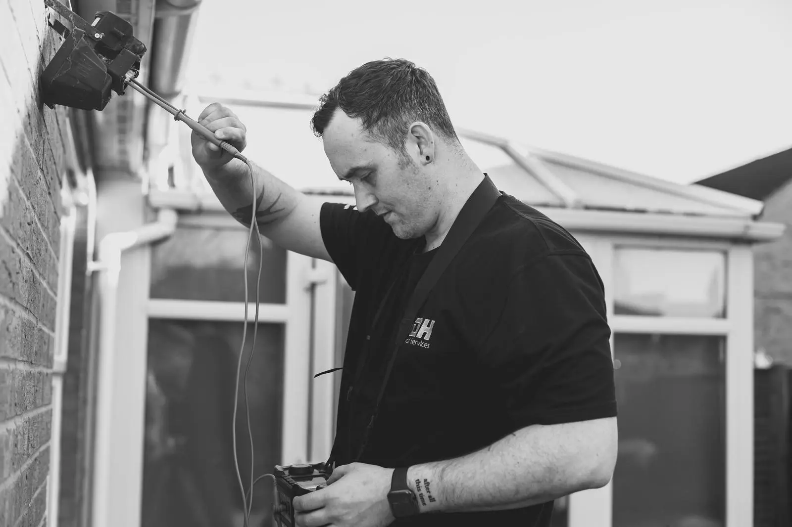 JDH electrician carrying out electrical work at a home