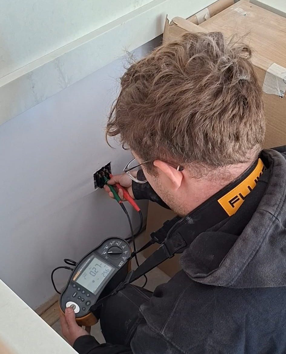 JDH electrical engineer carrying out inspection and testing work